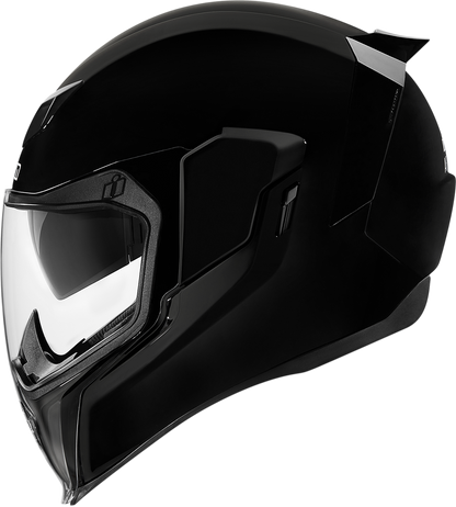 Black ICON Airflite™ helmet in gloss finish, medium size, featuring aerodynamic design and clear visor for motorcycle riding.