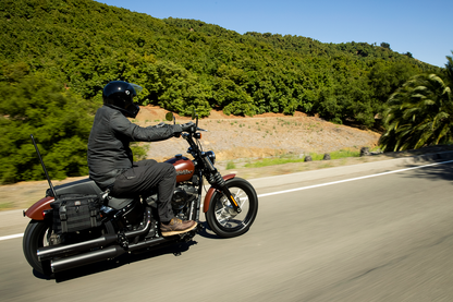 Black Biltwell Exfil-18 Saddlebags for motorcycle, durable bag with sleek design, mounted on a bike.