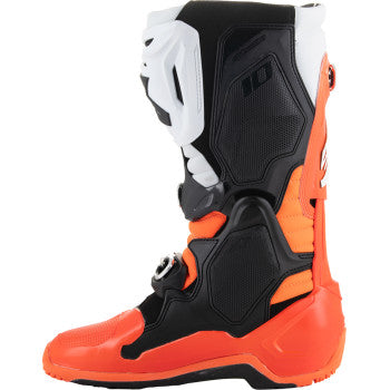 Alpinestars Tech 10 Enduro motorcycle boots in fluorescent orange, black, and white, showing the sturdy design and protective features.