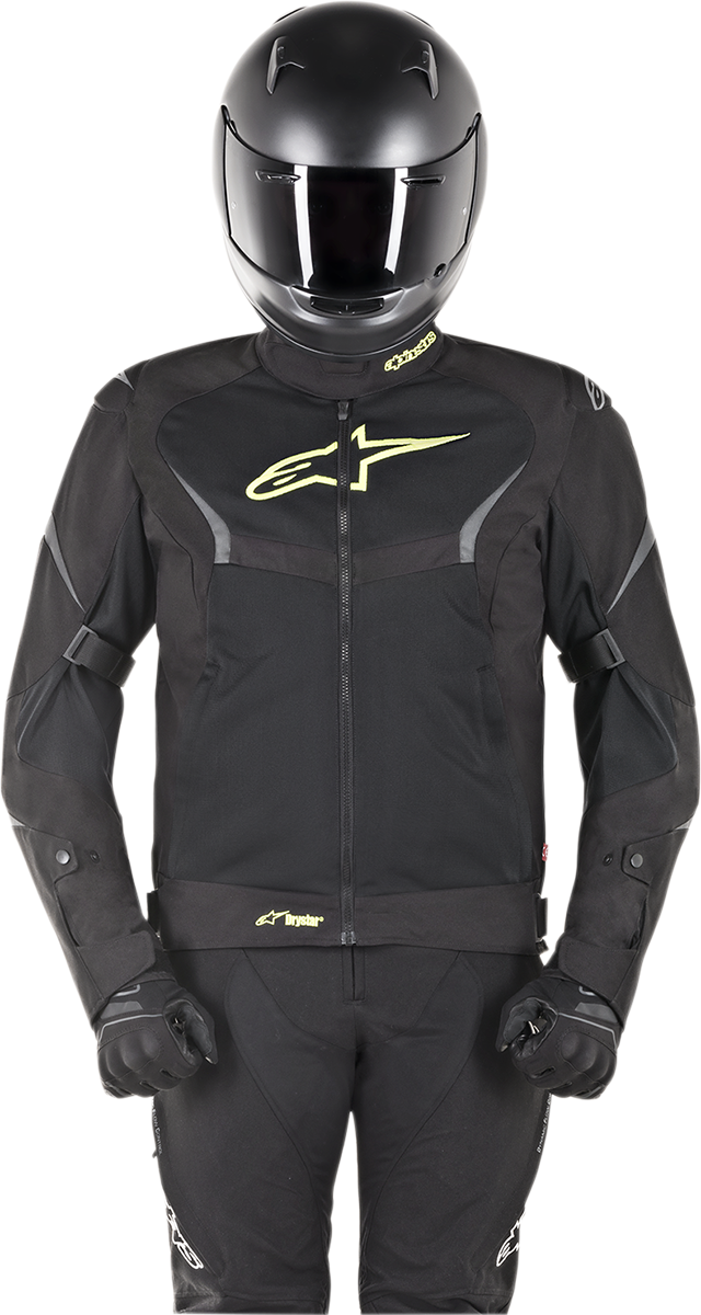 Alpinestars T-Core Drystar jacket in black and yellow, medium size, featuring protective design and waterproof fabric.