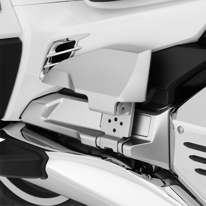 Bill's Exhausts Show Chrome passenger floorboard risers for Honda GL1800 motorcycle engine upgrade, showing chrome finish and mounting hardware