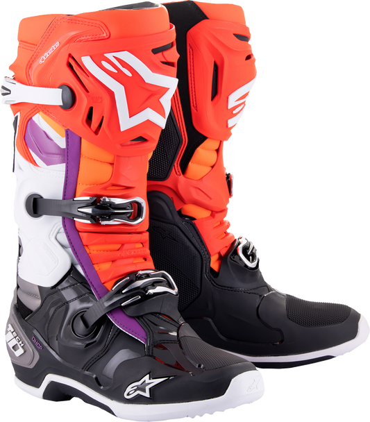 Alpinestars Tech 10 motorcycle boots in black, red, orange, and white with US size 11, featuring protective design and sturdy construction.