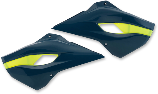 ACERBIS radiator shrouds in dark blue and yellow, designed for motorcycle body protection and style.
