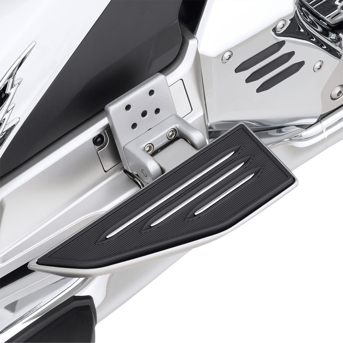Bill's Exhausts Show Chrome passenger floorboard risers for Honda GL1800 motorcycle, engine-mounted accessory, shiny chrome finish.