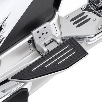 Bill's Exhausts Show Chrome passenger floorboard risers for Honda GL1800 motorcycle, engine-mounted accessory, shiny chrome finish.