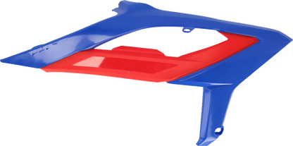 Red and black Acerbis radiator shrouds for Beta 2023 motorcycle, designed for body protection and style.