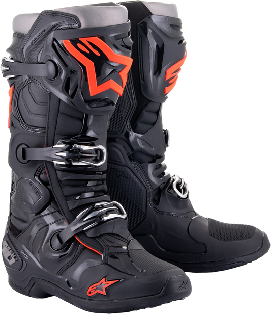 Alpinestars Tech 10 motorcycle boots in black and red fluorescent, US size 8, featuring protective design and sturdy construction.