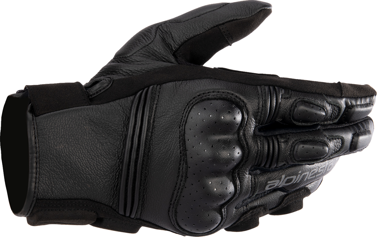 Black Alpinestars Women Phenom Gloves in XS size, featuring textured fingertips and padded knuckles for motorcycle riding.