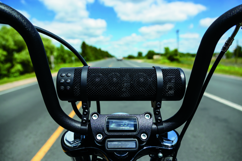 Kuryakyn Road Thunder Plus Sound Bar by MTX with weather-resistant marine speakers and Bluetooth connectivity, mounted on a motorcycle.