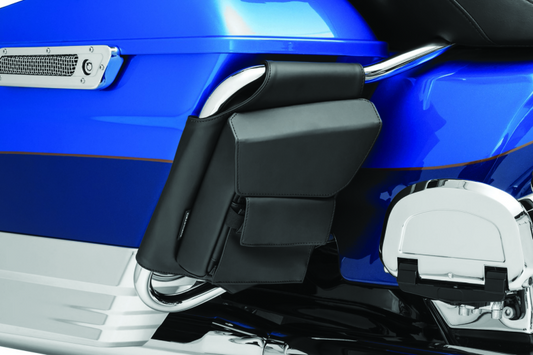 Kuryakyn Harley-Davidson touring saddlebag guard pouches attached to motorcycle saddlebags for added storage and protection.