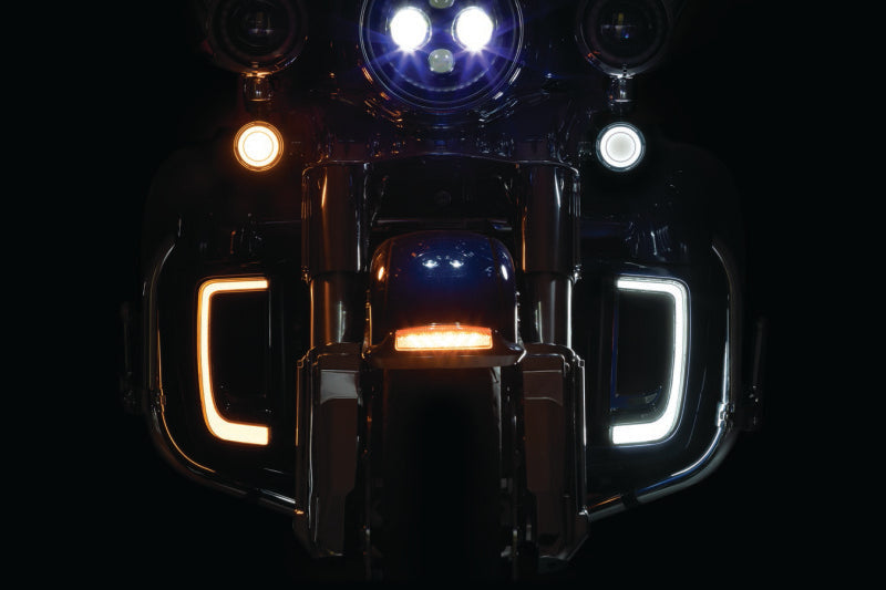 Kuryakyn Tracer LED front turn signal insert for Harley Davidson FLHX and FLTR 2008-2015 models, showing the bright LED turn signals.