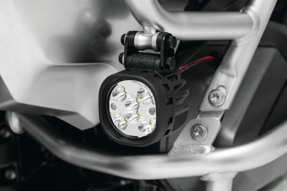 Kuryakyn Lodestar 750L spot beam driving lights mounted on a powersports vehicle for enhanced visibility and illumination.