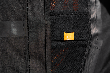 Black ICON PDX3™ Jacket in XL size, displayed on a hanger, showing its sleek design and high-quality fabric.