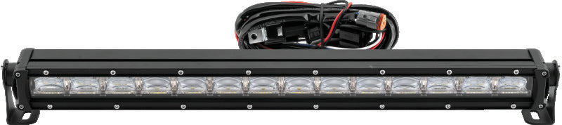 QuadBoss 11.5-inch single row DRL LED light bar with combo flood and spot beams, mounted on a vehicle for off-road illumination