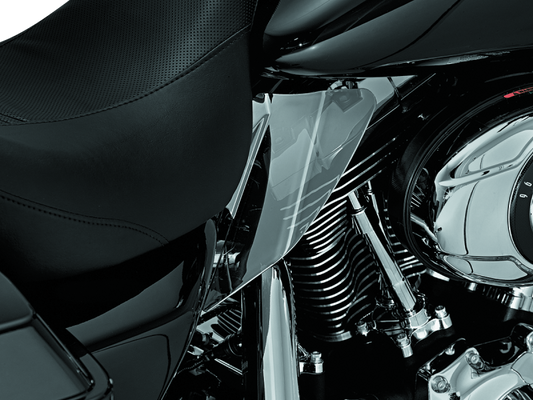 Kuryakyn Saddle Shields heat deflectors for Harley Davidson Touring models, smoke reflective finish on motorcycle seat area.