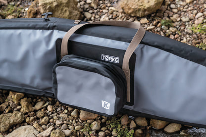 Kuryakyn Torke large removable dry pouch with waterproof design and MOLLE compatibility, shown attached and open on a motorcycle.