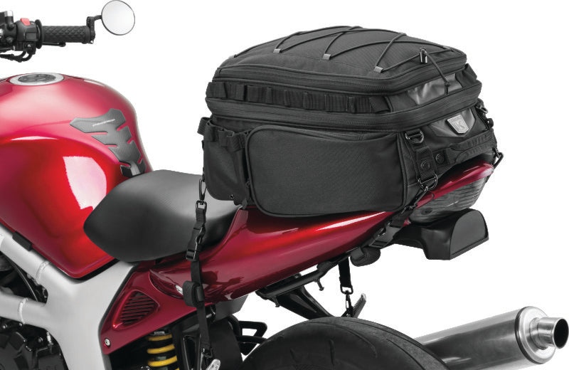 Kuryakyn Momentum Roamer motorcycle tail bag in durable 1200 Denier textile with weather-resistant features, mounted on a motorcycle.