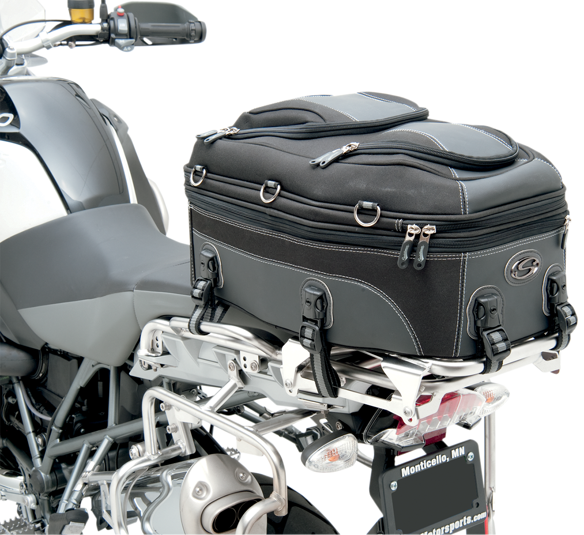 Bill's Exhausts SADDLEMEN Pillion and Rear Rack Luggage Bag on motorcycle seat, durable black leather with straps and buckles.