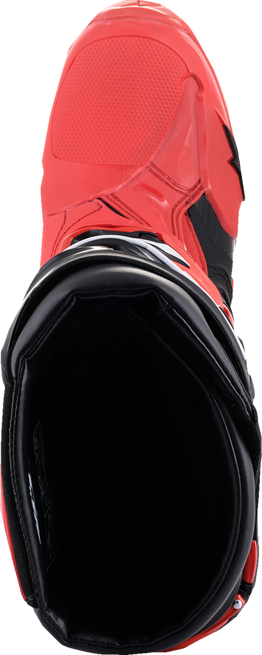 Alpinestars Tech 10 Acumen motorcycle boots in black and red with protective design, US size 10, featuring durable construction and branding.