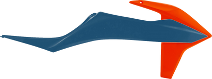 Acerbis radiator shrouds in orange and factory blue, designed for motocross or dirt bike body protection and styling.