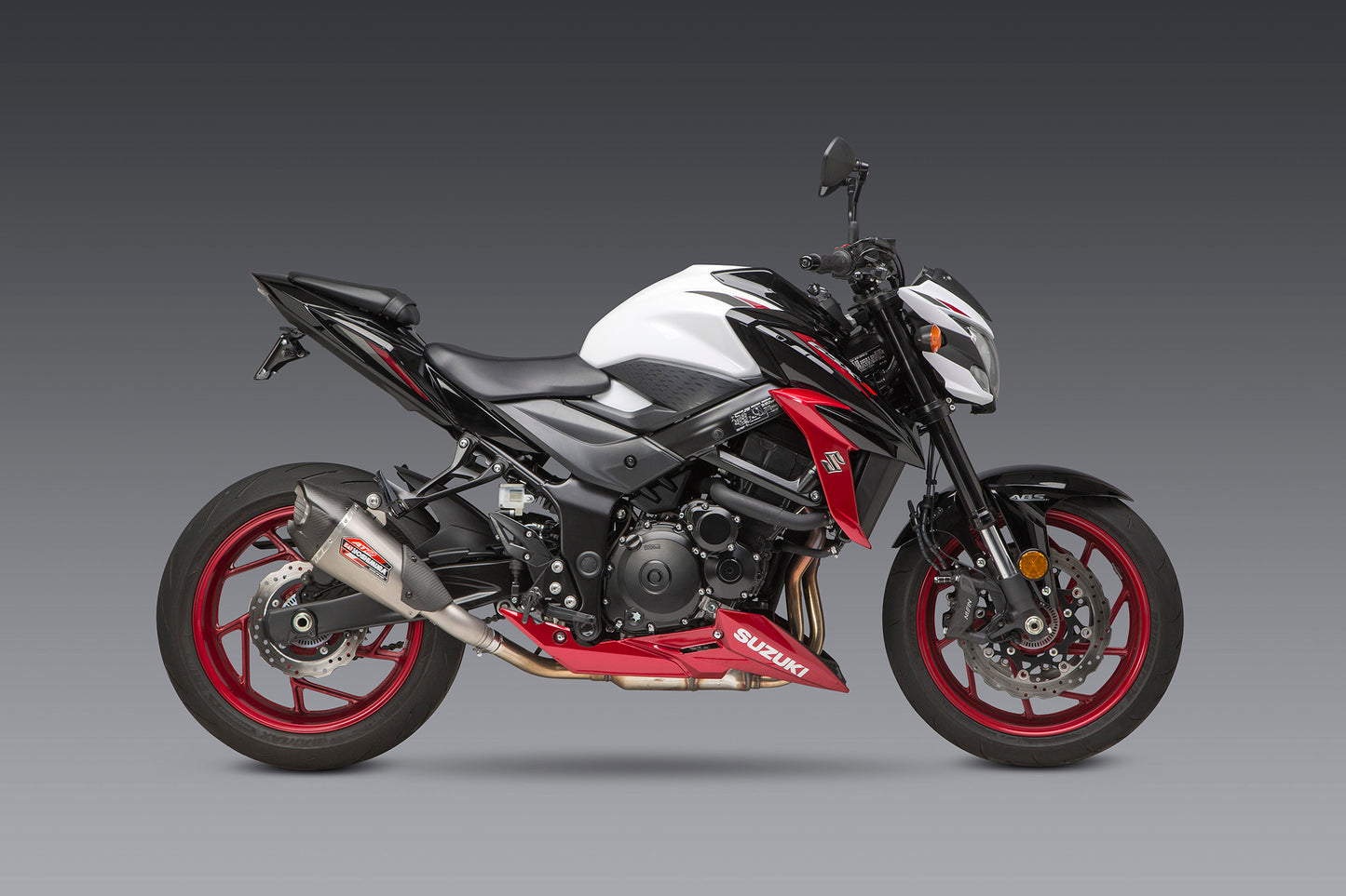 YOSHIMURA Street AT2 slip-on exhaust with carbon fiber end cap and works finish for motorcycles.