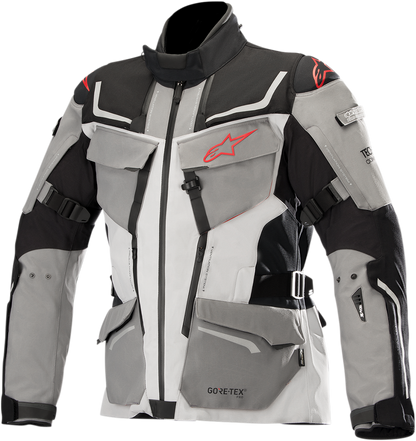 Alpinestars Revenant jacket in black, gray, and red displayed on a hanger, showcasing its stylish motorcycle jacket design.
