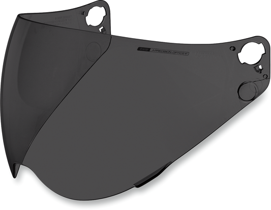 Dark smoke ICON Variant™ Optics™ shield for helmets, showing tinted, curved visor with reflective finish.