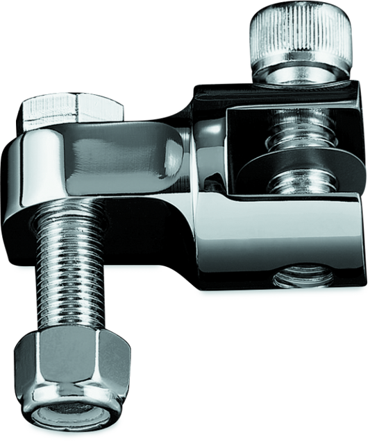 Chrome Kuryakyn 1-1/4 inch stirrup heel rest extenders for Harley-Davidson motorcycles, shown installed on foot pegs.
