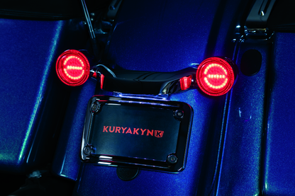 Kuryakyn Luminez LED rear turn signal insert in red for Harley-Davidson, 1157 style, with bright LED lights and clear lens.