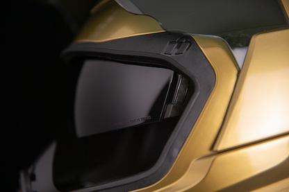 Bill's Exhausts ICON Airflite™ Jewel MIPS® helmet in gold, large size, featuring aerodynamic design and safety features.