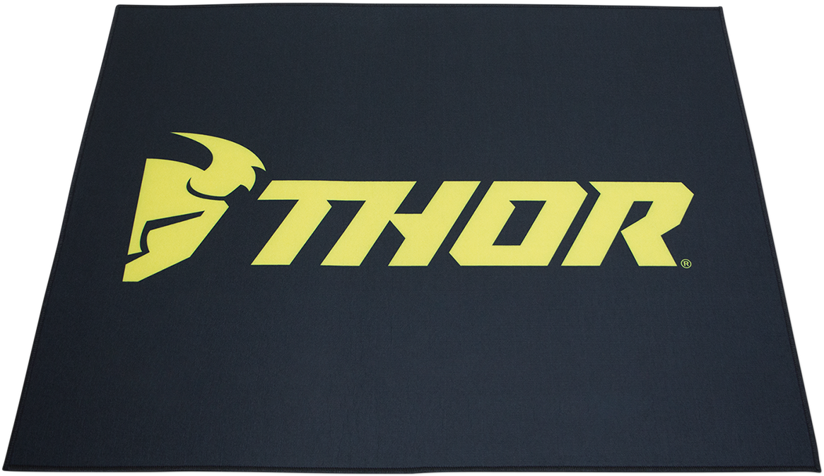 Black and yellow THOR motorcycle pit area mat with absorbent surface, designed for small pit areas, model HC80100THOR.