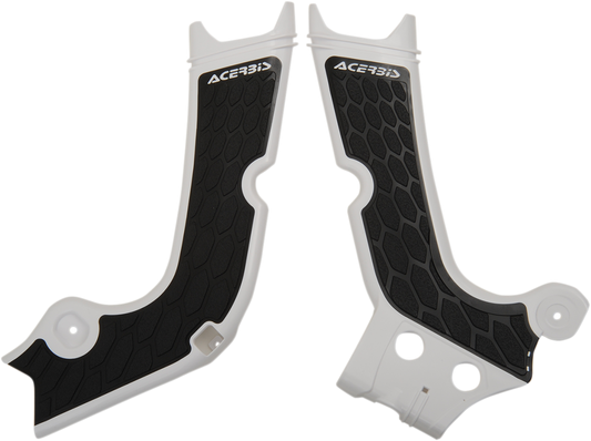 Acerbis X-Grip Frame Guards in white and black installed on a motorcycle frame for protection.