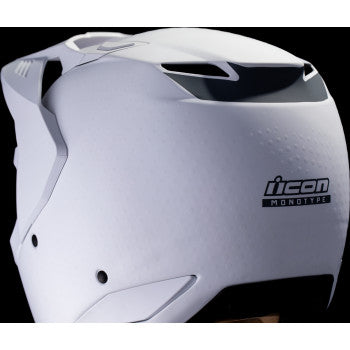 White ICON Elsinore™ helmet in large size with Monotype design, featuring a sleek motorcycle helmet style and ventilation vents.
