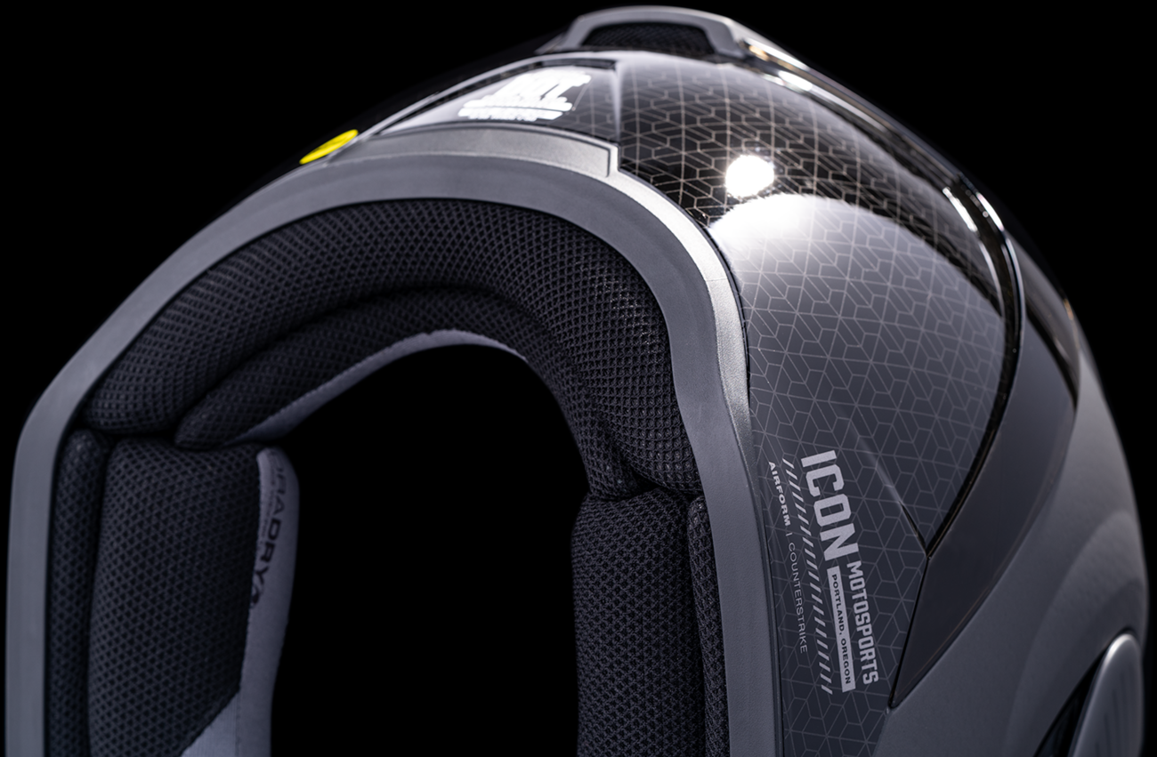Silver ICON Airform™ helmet with MIPS® technology in medium size, featuring a sleek design and ventilation for motorcycle riding.