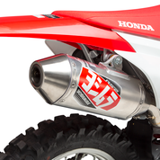 YOSHIMURA RS-2 header, canister, and end cap exhaust system for motorcycle with polished metal finish and performance-oriented design