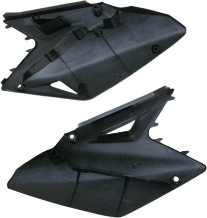 Black Acerbis side panels for motorcycle body, designed for a sleek fit and durable protection.