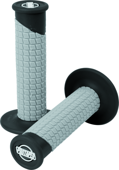 ProTaper Clamp-On Pillow Top Grips in black and gray, designed for motorcycle handlebars, with textured surface for comfortable grip.