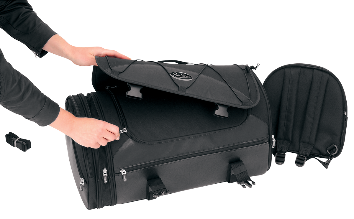 Bill's Exhausts SADDLEMEN TR3300DE Deluxe Rack Bag mounted on motorcycle seat, showcasing durable storage with straps and zippers.