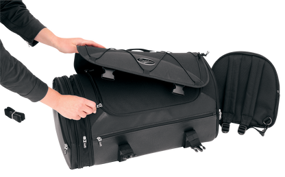 Bill's Exhausts SADDLEMEN TR3300DE Deluxe Rack Bag mounted on motorcycle seat, showcasing durable storage with straps and zippers.