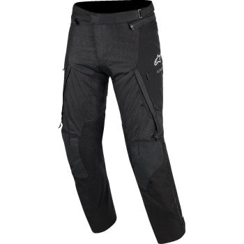 Black Alpinestars Andes Drystar V4 riding pants, size M, designed for motorcycle riding with protective features.