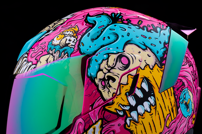 Pink ICON Airflite™ Helmet with Snack Attack design, small size, MIPS® safety system, featuring sleek aerodynamic shape.