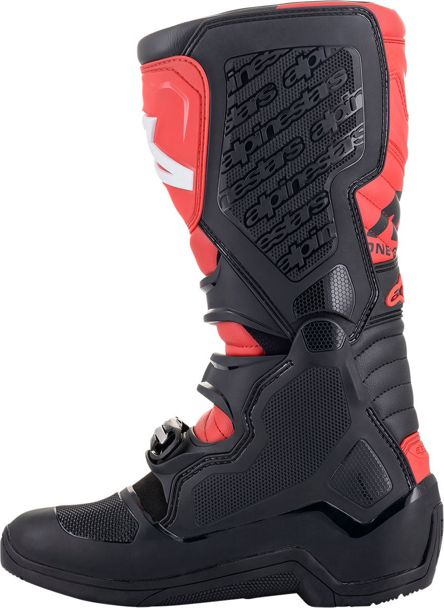 Alpinestars Tech 5 motorcycle boots in black and red with sturdy construction and branding, shown from the side view.