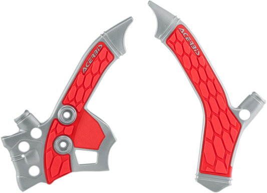 A pair of silver and red Acerbis X-Grip motorcycle frame guards mounted on a bike, providing protection and style.