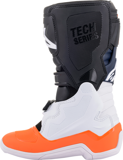 Alpinestars Youth Tech 7S motocross boots in black, orange, and white with sturdy design and branding visible.