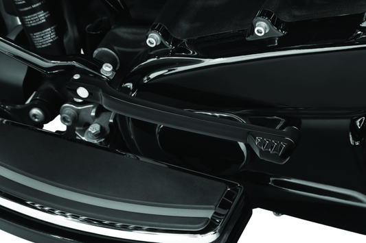 Kuryakyn switch-shift lever for Harley Davidson motorcycles, shown in close-up with chrome finish and detailed design.