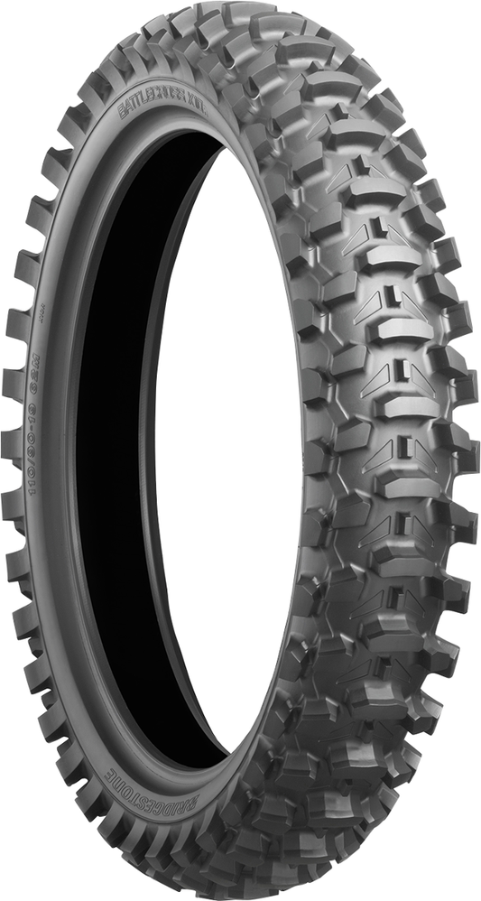 BRIDGESTONE Battlecross X10 rear motorcycle tire 110/90-19 with aggressive tread for mud and sand traction.