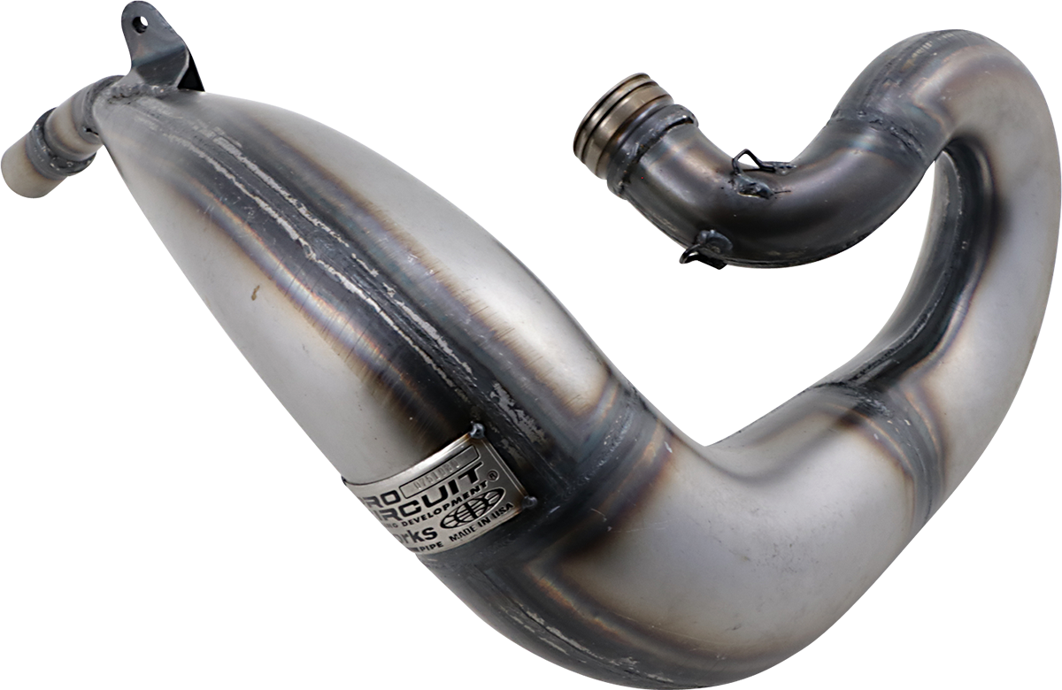 PRO CIRCUIT Works Pipe motorcycle exhaust with bare metal finish, designed for enhanced performance and sleek appearance.