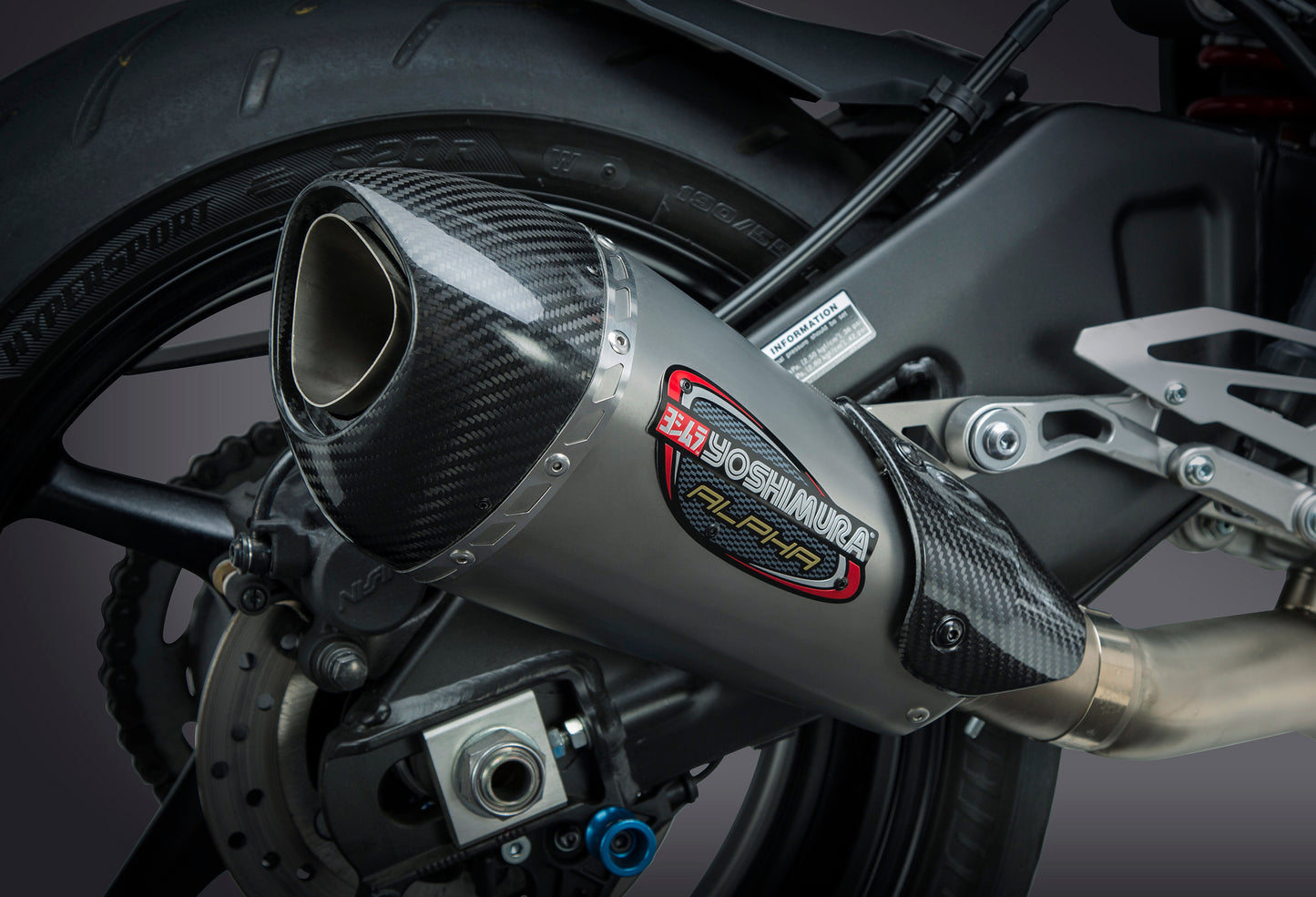 YOSHIMURA Yoshimura Exhaust Race Alpha T 3/4 Slip-On with carbon fiber end cap mounted on motorcycle side view