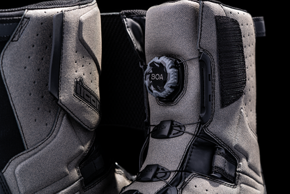 Gray ICON Alcan waterproof boots by Bill's Exhausts, size 7, featuring durable waterproof leather and sturdy rubber soles.
