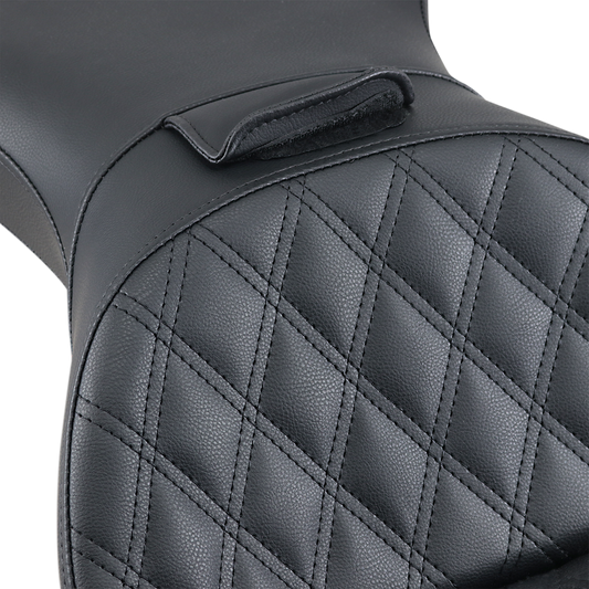 Black SADDLEMEN Explorer Seat with backrest and lattice stitching for FLSTS motorcycles, designed for comfort and style.